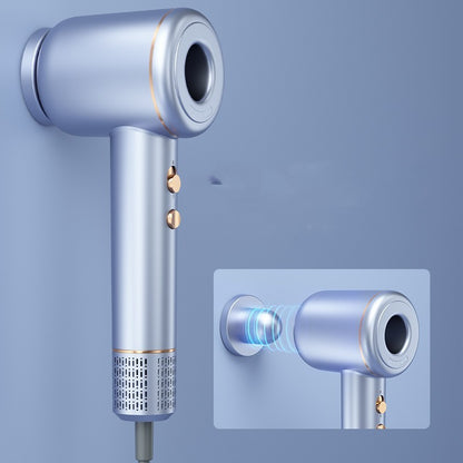 Adjustable speed hair dryer for all hair types in sleek metallic gray with gold buttons