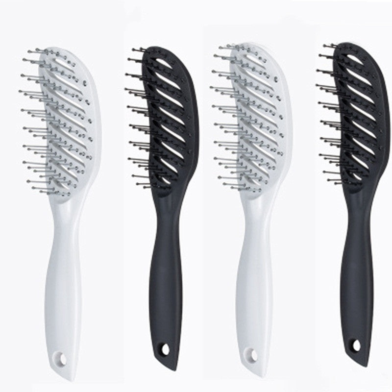 Set of four anti-static vent comb hairbrushes in white and black designs for smooth styling