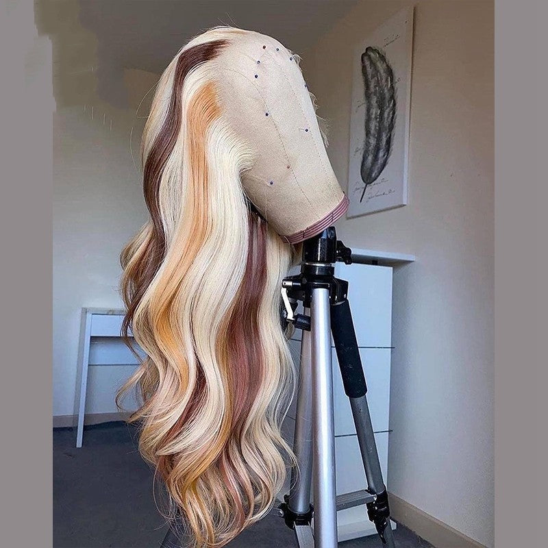 Brown blonde human hair wig with long waves on a display mannequin for stylish looks