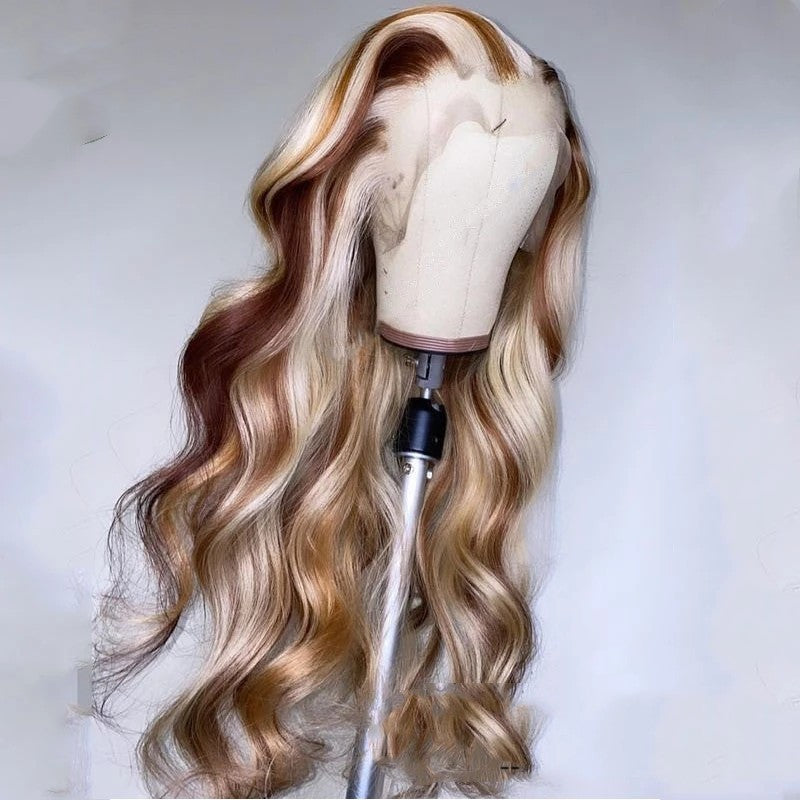 Luxurious brown blonde human hair wig on a mannequin featuring soft, wavy strands for a natural look