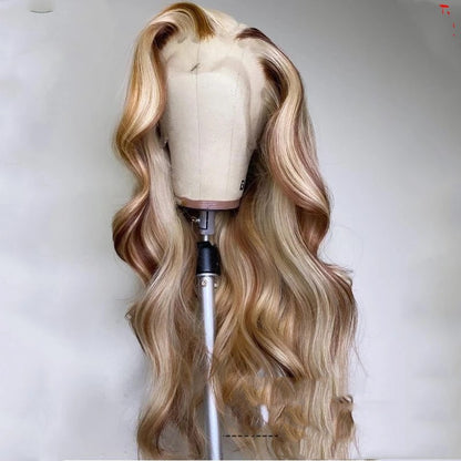 Brown blonde human hair wig with soft waves displayed on a mannequin head
