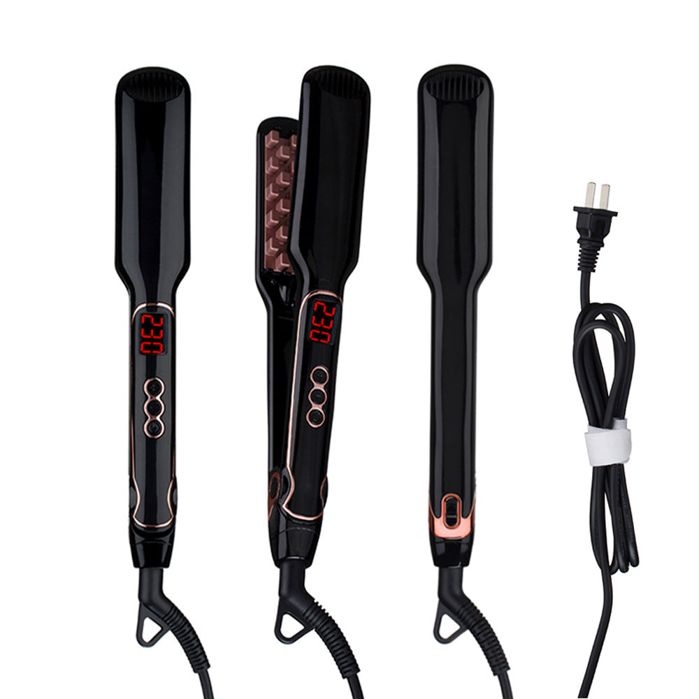 Black electric hair straightener showing digital temperature display with ceramic straightening brush for all hair types