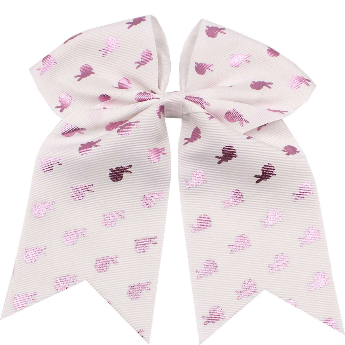 Children's rainbow hair accessories with a large pink bow featuring heart patterns