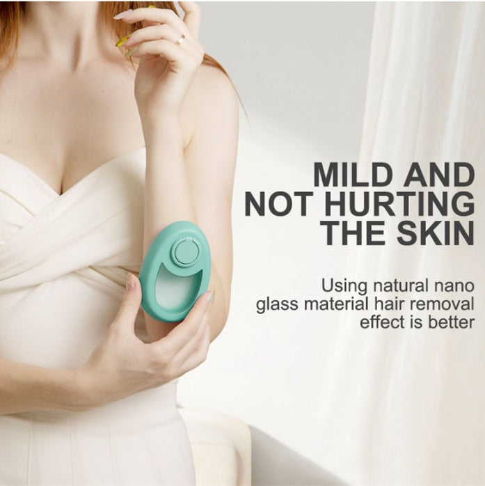 Magic crystal hair eraser for women and men held by woman in white dress for gentle hair removal