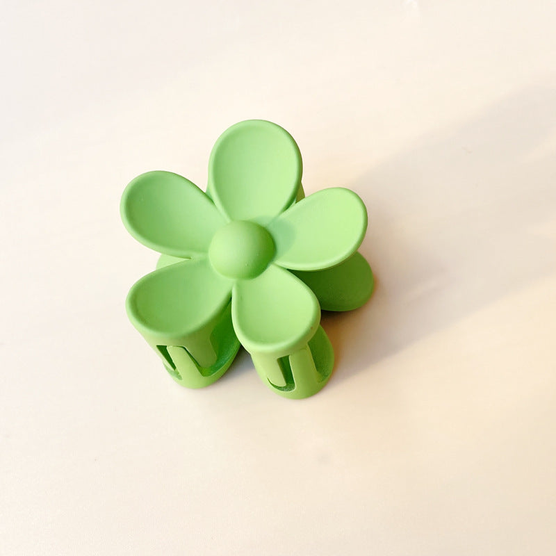 Bright green colorful flower hair clip with frosted petals for summer style