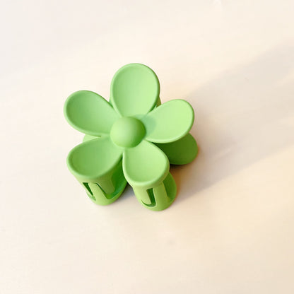 Bright green colorful flower hair clip with frosted petals for summer style