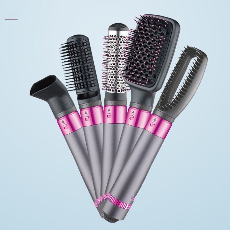 Easy use hair straightener for all hair types with five interchangeable styling brushes in silver and pink