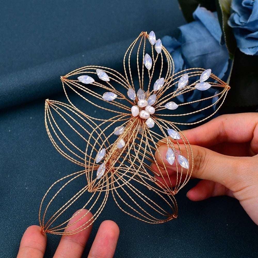 Antique bridal headdress with elegant leaf design hair comb featuring gold wire and pearl accents