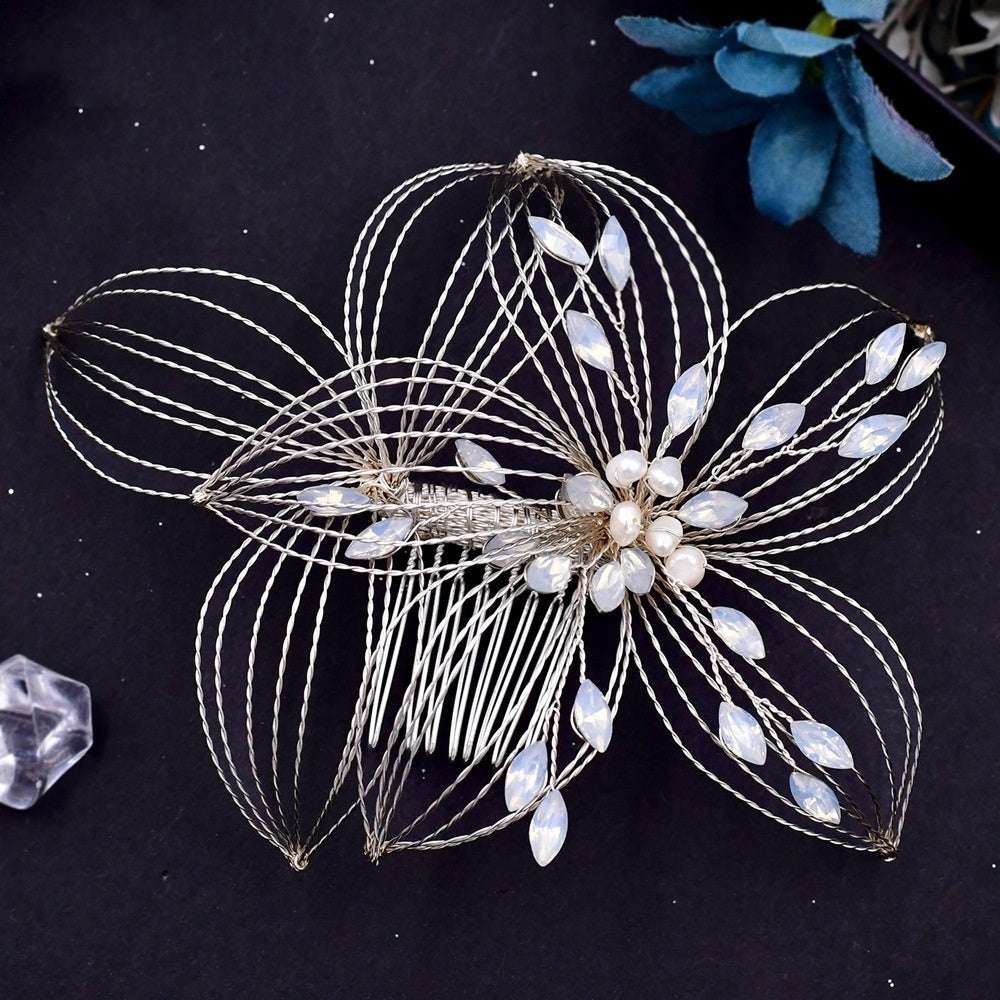 Antique bridal headdress with elegant leaf design hair comb featuring pearls and crystals on delicate wire