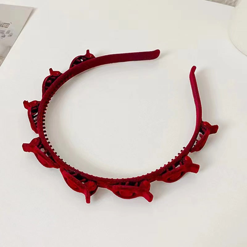 Red finishing hair clip designed for securing broken hair and adding style to your look