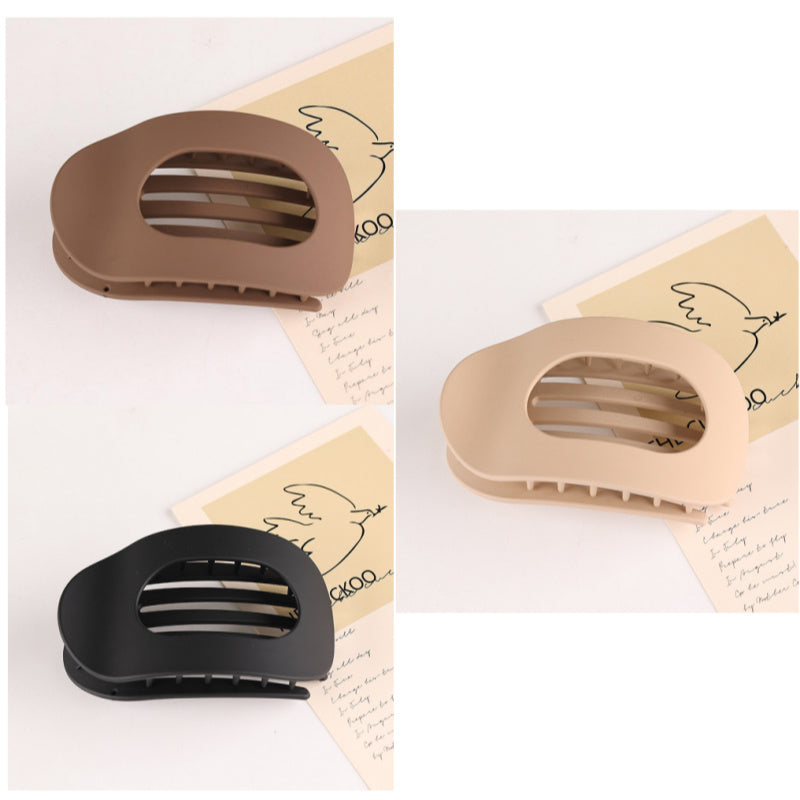 Set of three flat oval hair barrette clips in brown beige and black for back head updo styling