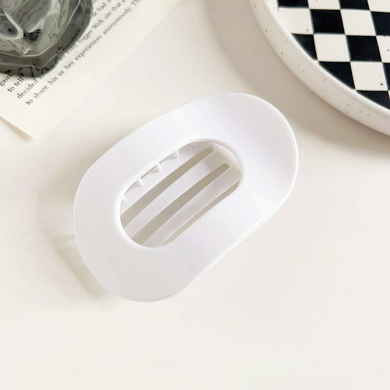 White flat oval hair barrette with a smooth finish for back head updo hairstyle