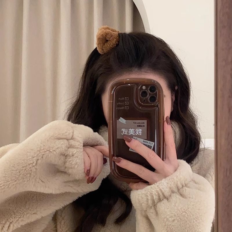 Fuzzy bear hair clips styled in hair, perfect for adding a cute touch to your look