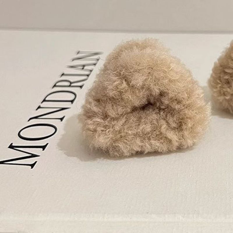 Fuzzy bear hair clips in soft beige for stylish hair accessories and playful looks