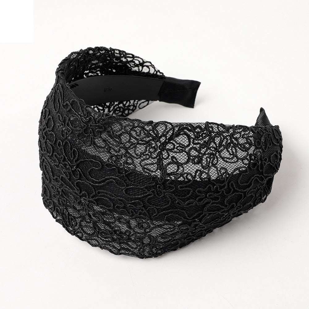 Black lace wide brim hair hoop featuring intricate floral designs for stylish hair accessories