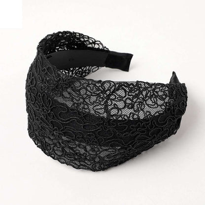 Black lace wide brim hair hoop featuring intricate floral designs for stylish hair accessories