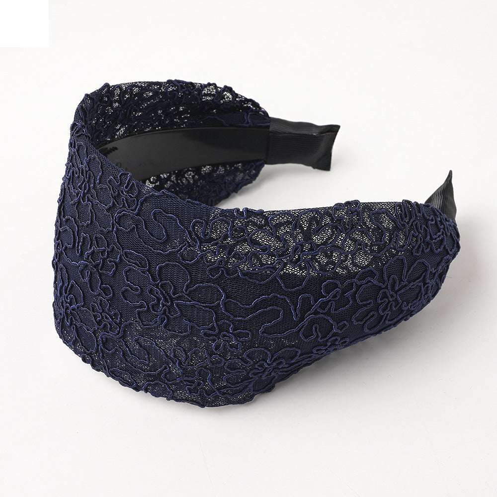 Navy blue lace wide brim hair hoop featuring intricate floral design for stylish hairstyles