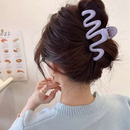 Stylish Back Shape Mosquito Coil TT Comb Hair Clip in Purple, a trendy luxury hair accessories item