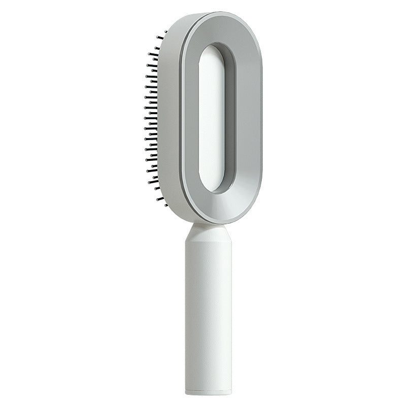 One-key cleaning hairbrush designed for easy and efficient hair removal and maintenance