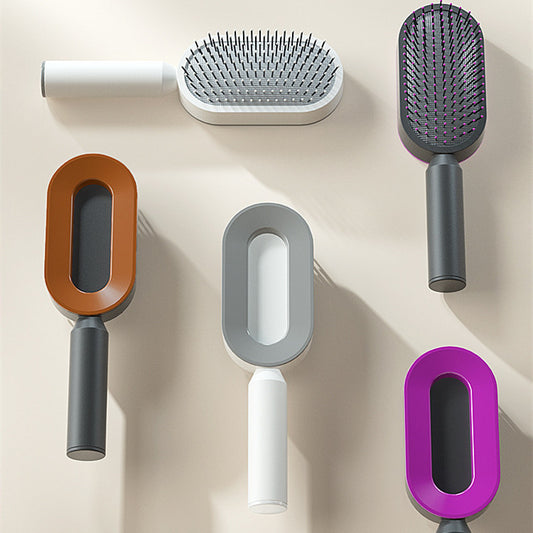 Assorted one-key cleaning hairbrushes in various colors and styles for easy hair maintenance