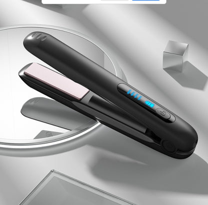 Portable cordless hair straightener with sleek design and digital display for easy styling
