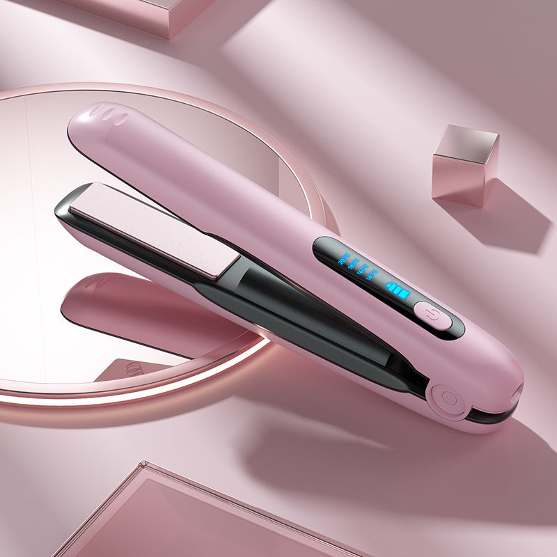 Portable cordless hair straightener in pink with digital display for easy styling on the go