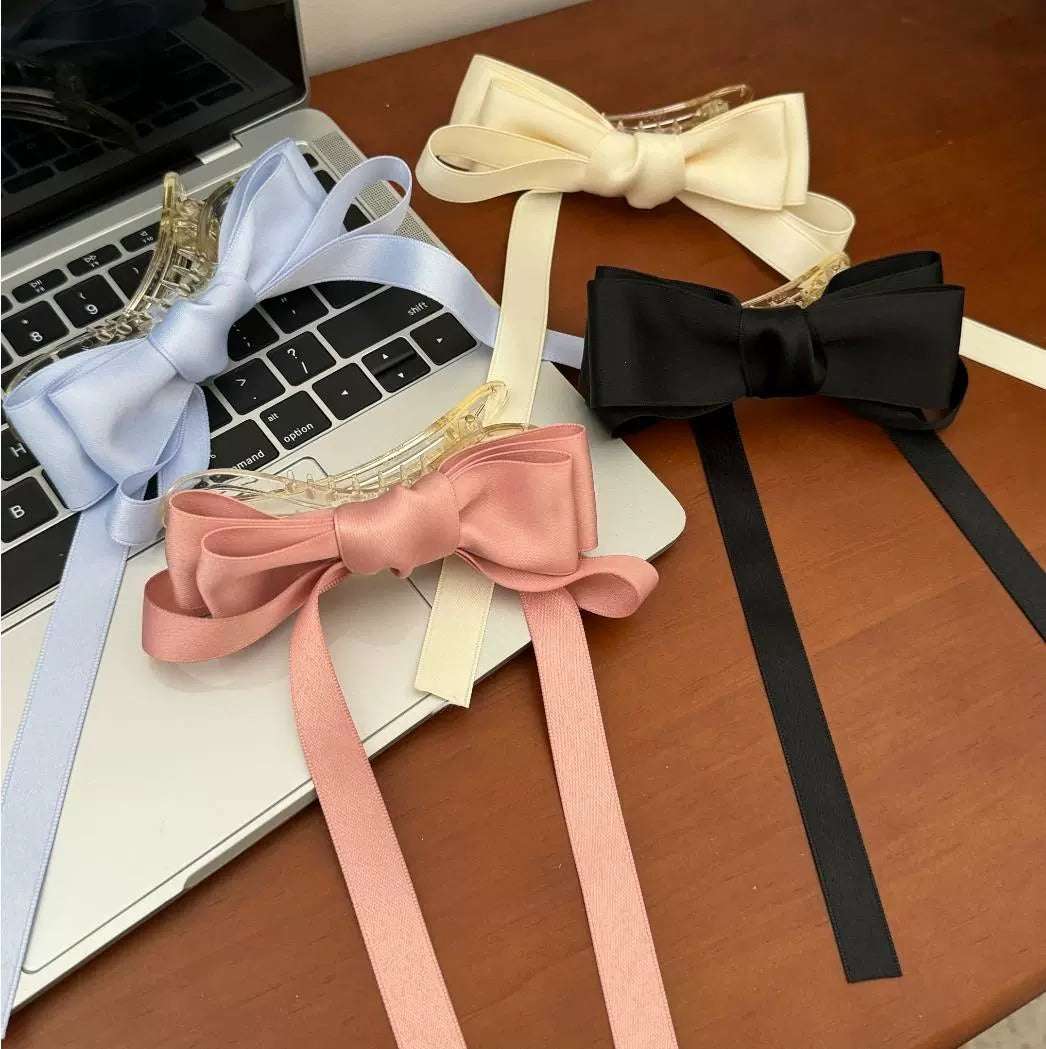 Collection of premium French barrettes for women in pastel colors with ribbon details