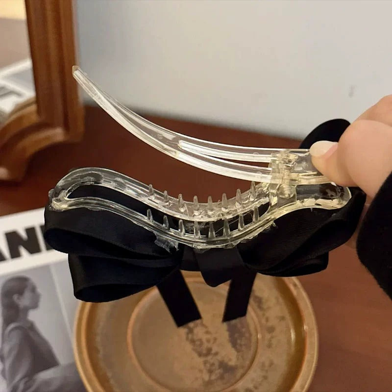 Clear premium French barrettes for women with black ribbon bow, perfect for elegant hairstyles