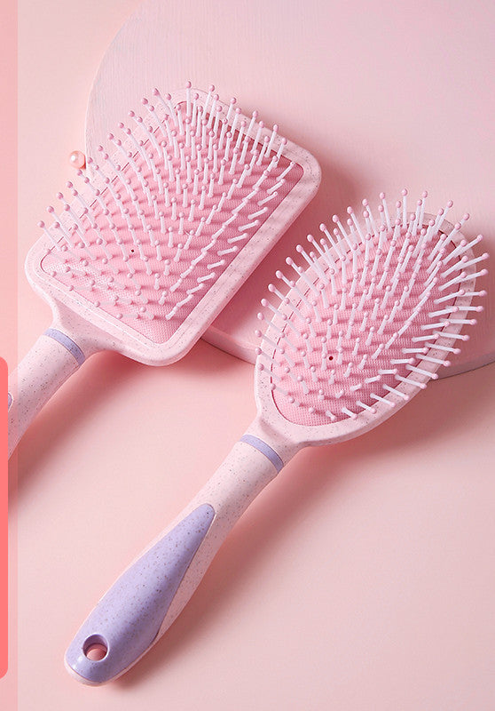 Professional airbag comb set with pink bristles and ergonomic handles for personal wash and hair care