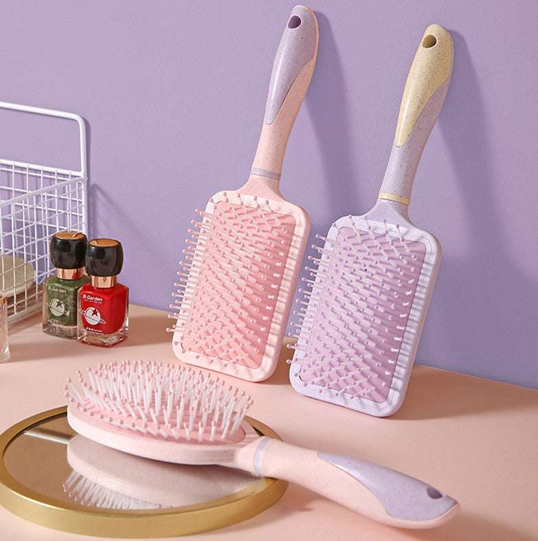 Professional airbag comb set with pastel pink and purple paddle brushes for personal wash and hair care