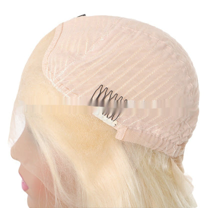 Close-up of a real human hair transparent lace wig cap featuring adjustable clips for a secure fit