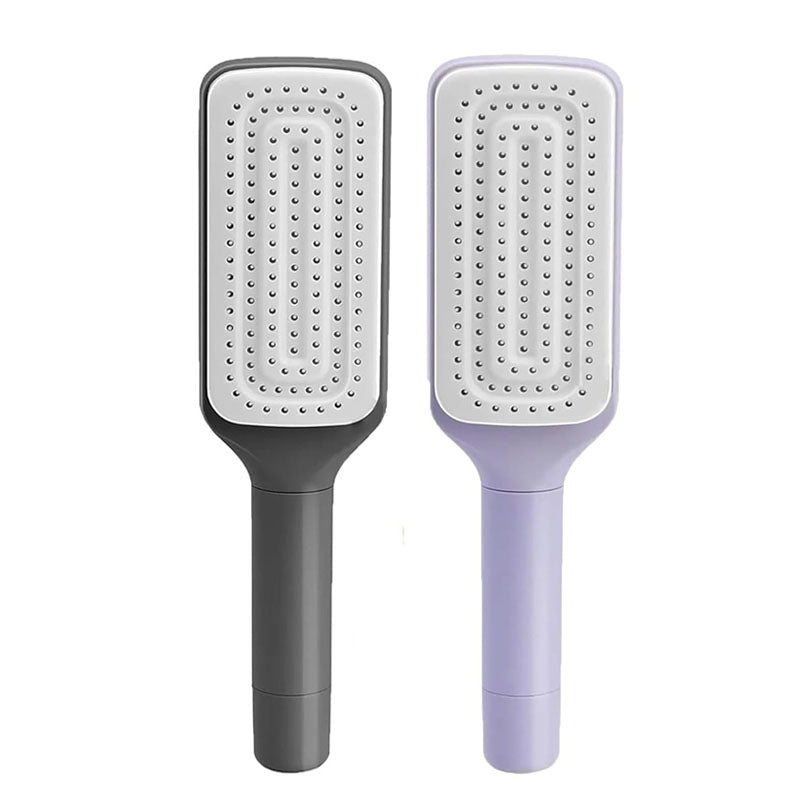 Self cleaning hair brush in black and purple with ergonomic handle for easy grooming