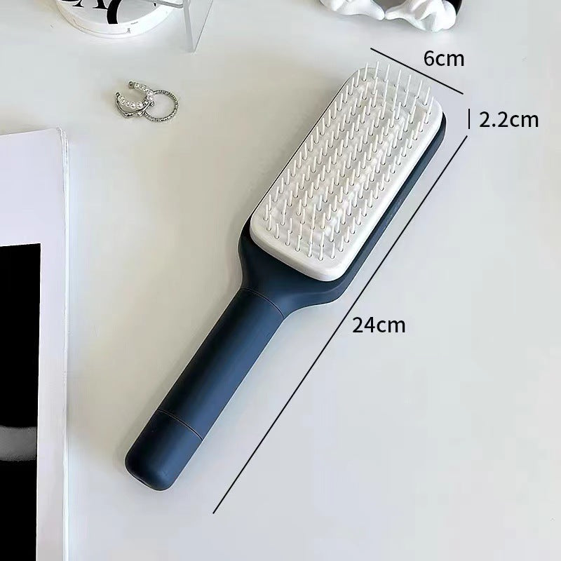 Self cleaning hair brush with ergonomic design and dimensions 24cm x 6cm x 2.2cm for easy grooming