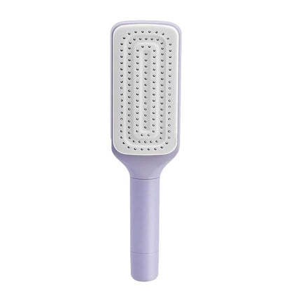 Purple self cleaning hair brush with ergonomic handle for easy styling and maintenance