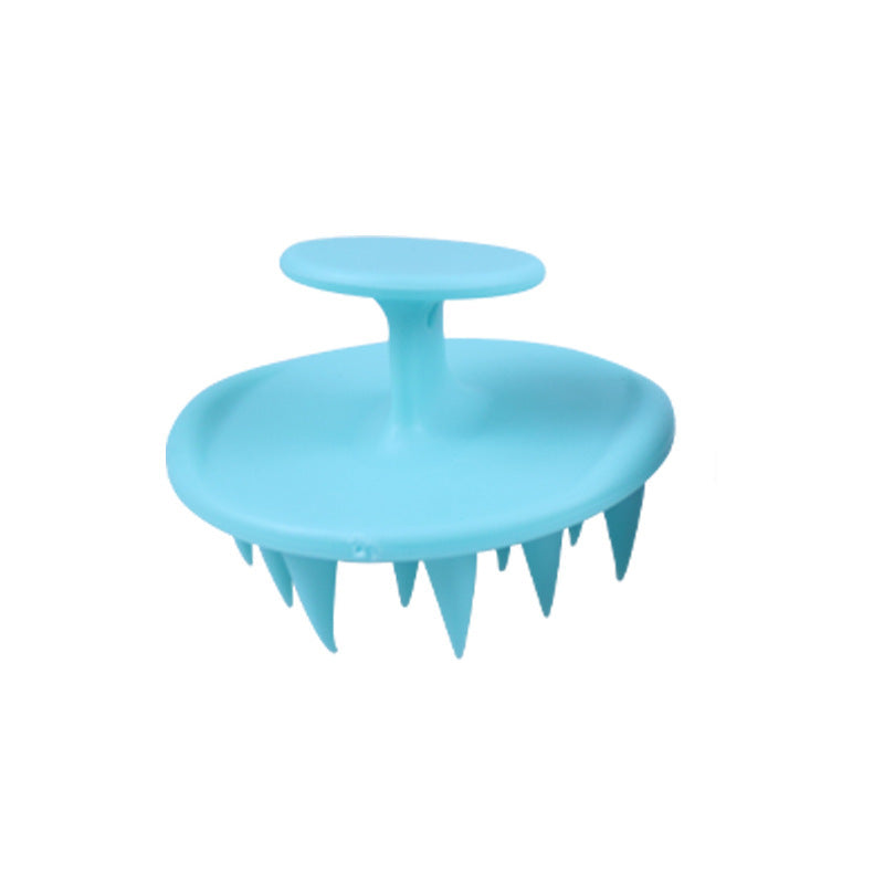 Light blue silicone shampoo brush with soft bristles for scalp massage and deep cleaning