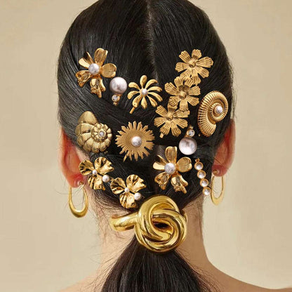Lady's Flower Simple Titanium Steel Hair Barrette in gold with floral designs and pearl accents